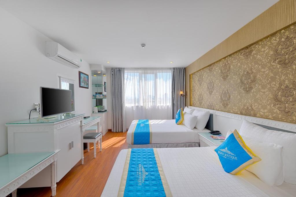 Двухместный (Двухместный номер Делюкс с 2 отдельными кроватями) отеля GalaVina Hotel Da Nang, Дананг