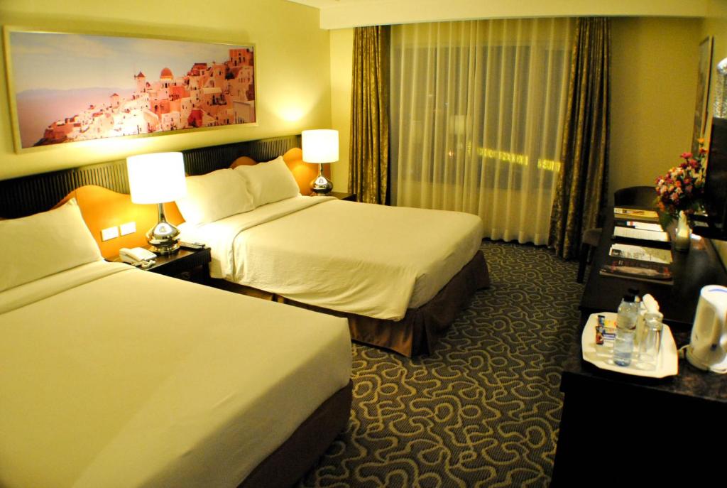 Двухместный (Двухместный номер Делюкс с 2 отдельными кроватями) отеля Hotel Elizabeth Cebu, Себу