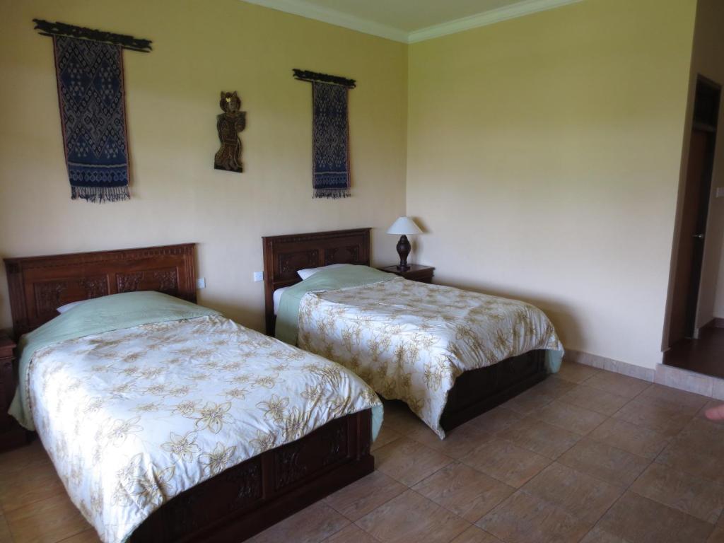 Двухместный (Двухместный номер с 2 отдельными кроватями и окном), Nuriani Restaurant and Rooms