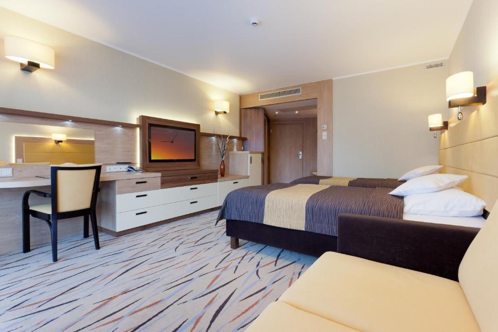 Двухместный (Улучшенный двухместный номер с 1 кроватью или 2 отдельными кроватями) отеля Hotel Wellness Medical Spa Unitral, Мельно