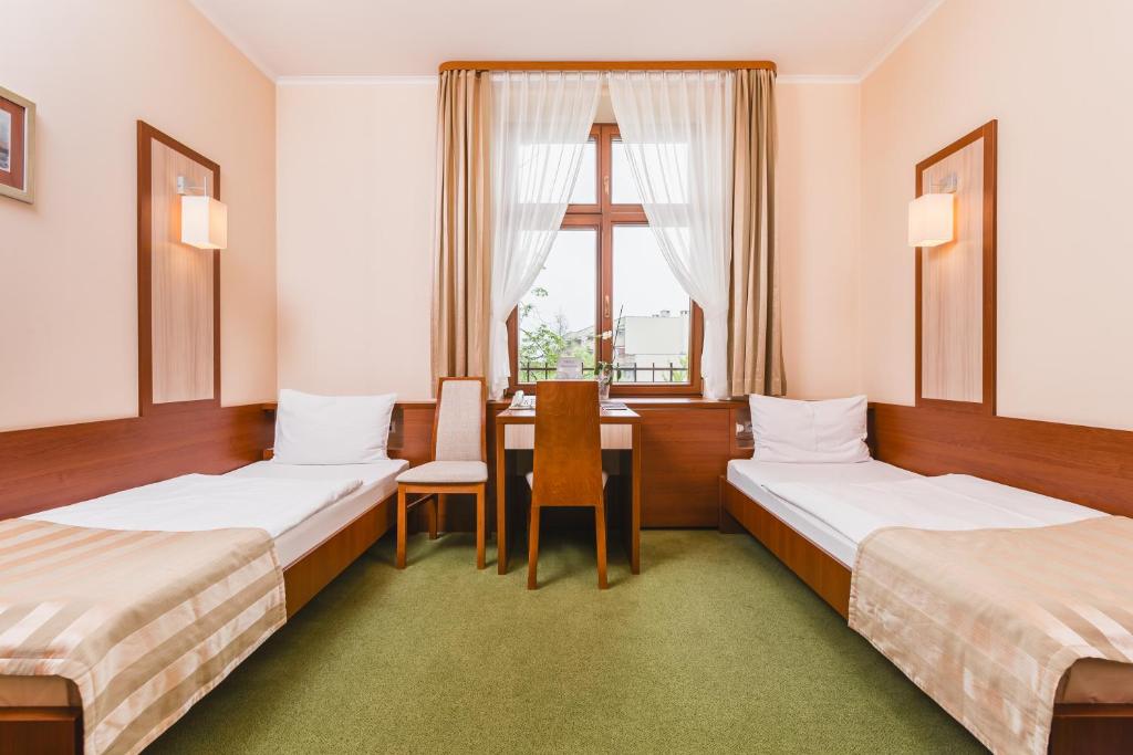 Двухместный (Двухместный номер с 2 отдельными кроватями) отеля Domus Mater, Краков