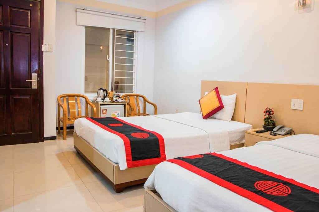 Двухместный (Улучшенный двухместный номер с 2 отдельными кроватями) отеля Le Duong Hotel, Нячанг