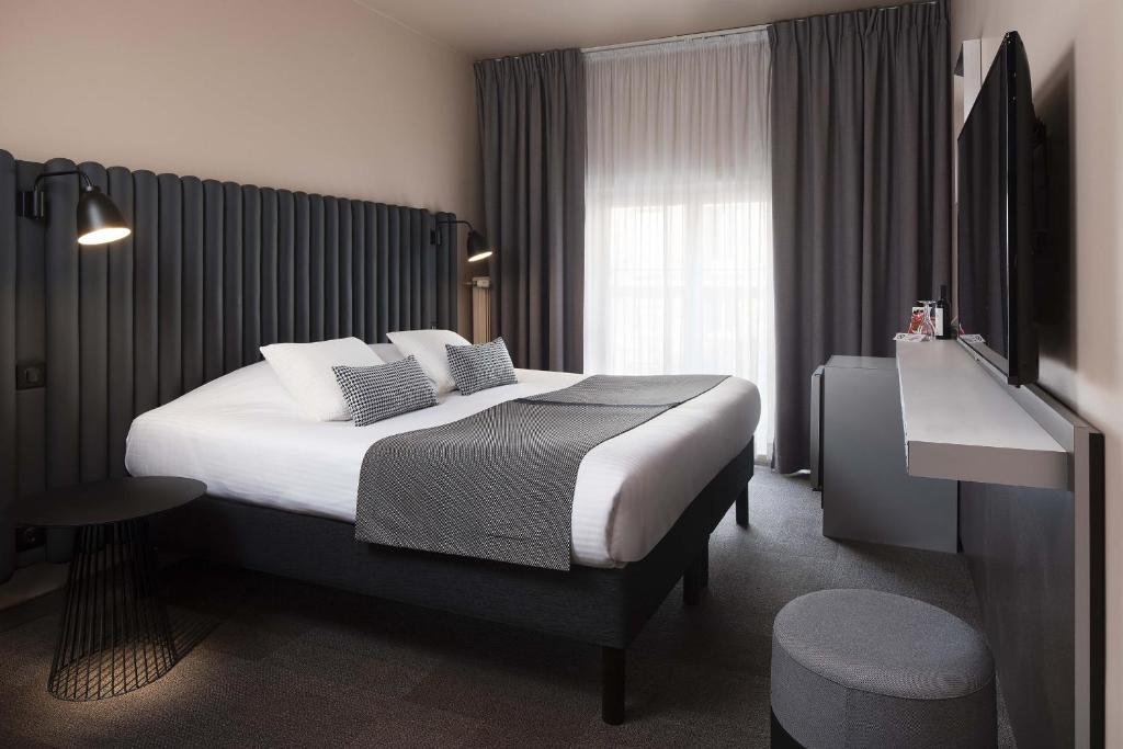 Двухместный (Улучшенный двухместный номер с 1 кроватью) отеля Hôtel Diana Dauphine, Страсбург