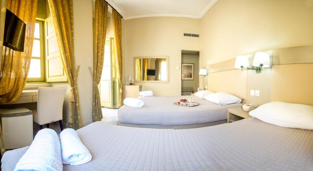 Трехместный (Трехместный номер) отеля Diogenis Hotel, Эрмоуполис
