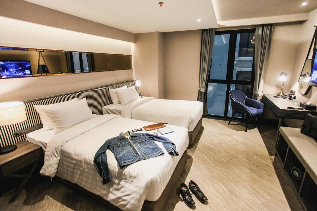Двухместный (Двухместный номер Делюкс с 2 отдельными кроватями) отеля Vince Hotel Pratunam, Бангкок