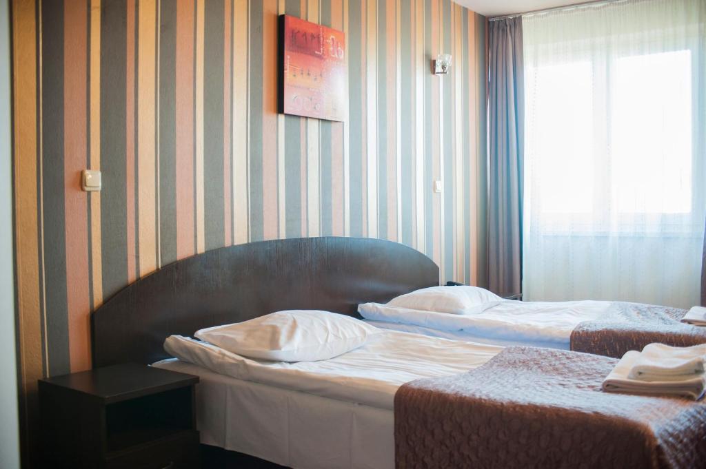 Двухместный (Двухместный номер с 2 отдельными кроватями) отеля Hotel Horyzont, Жешув