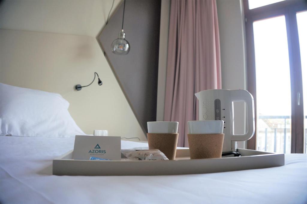 Двухместный (Двухместный номер Делюкс с 2 отдельными кроватями) отеля Azoris Angra Garden – Plaza Hotel, Ангра-ду-Эроижму