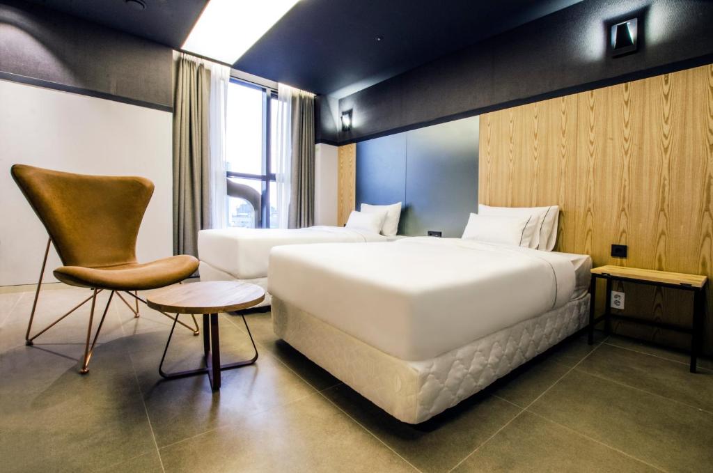 Двухместный (Двухместный номер Делюкс с 2 отдельными кроватями) отеля Hotel The Designers Premier Kondae, Сеул