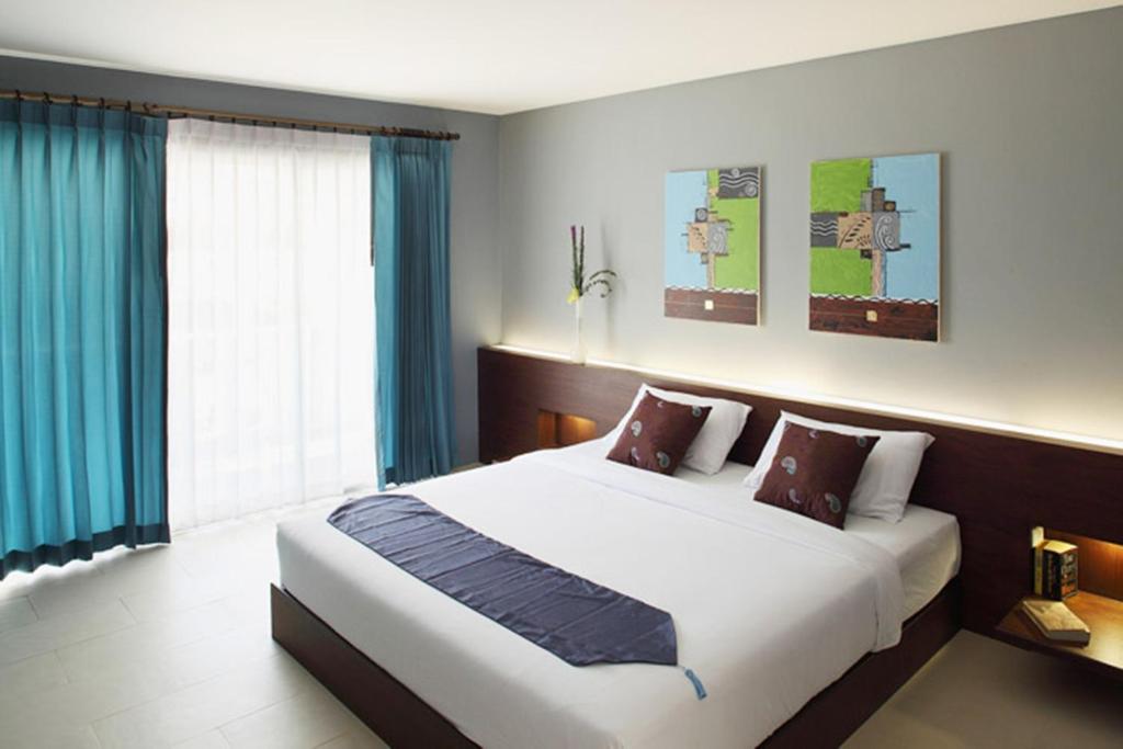 Двухместный (Улучшенный двухместный номер с 1 кроватью) отеля Samkong Place, Пхукет