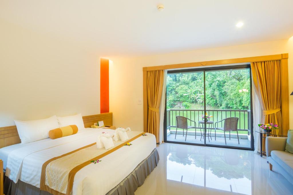 Двухместный (Двухместный номер Делюкс с 1 кроватью или 2 отдельными кроватями) отеля Tinidee Golf Resort at Phuket, Пхукет