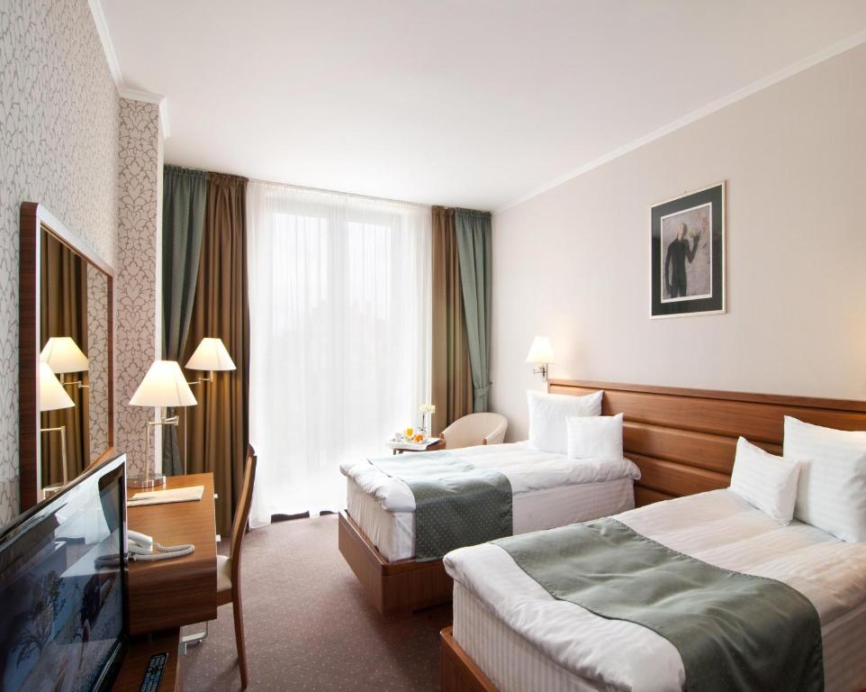 Двухместный (Двухместный номер с 2 отдельными кроватями - Подходит для гостей с ограниченными физическими возможностями - Для некурящих) отеля Ramada Hotel Cluj, Клуж-Напока
