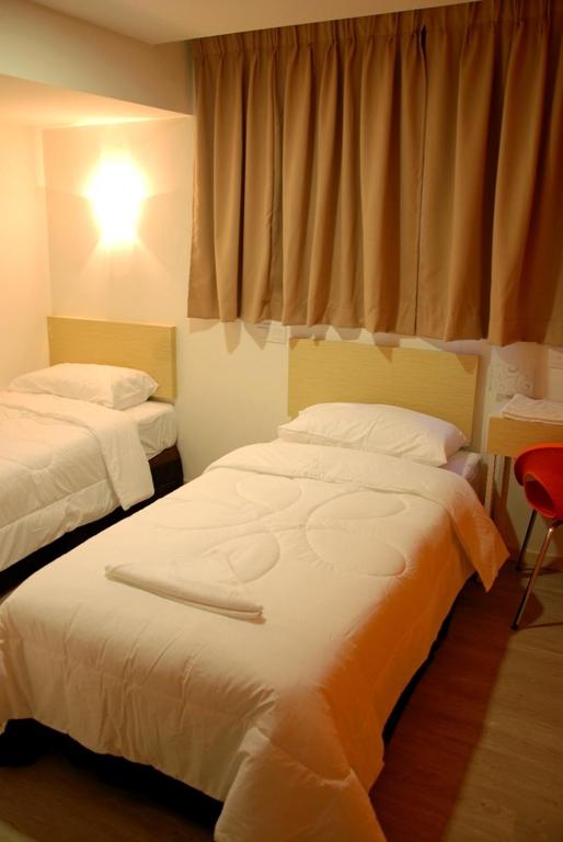 Двухместный (Двухместный номер Делюкс с 2 отдельными кроватями) отеля Old Penang Hotel - Penang Times Square, Джорджтаун