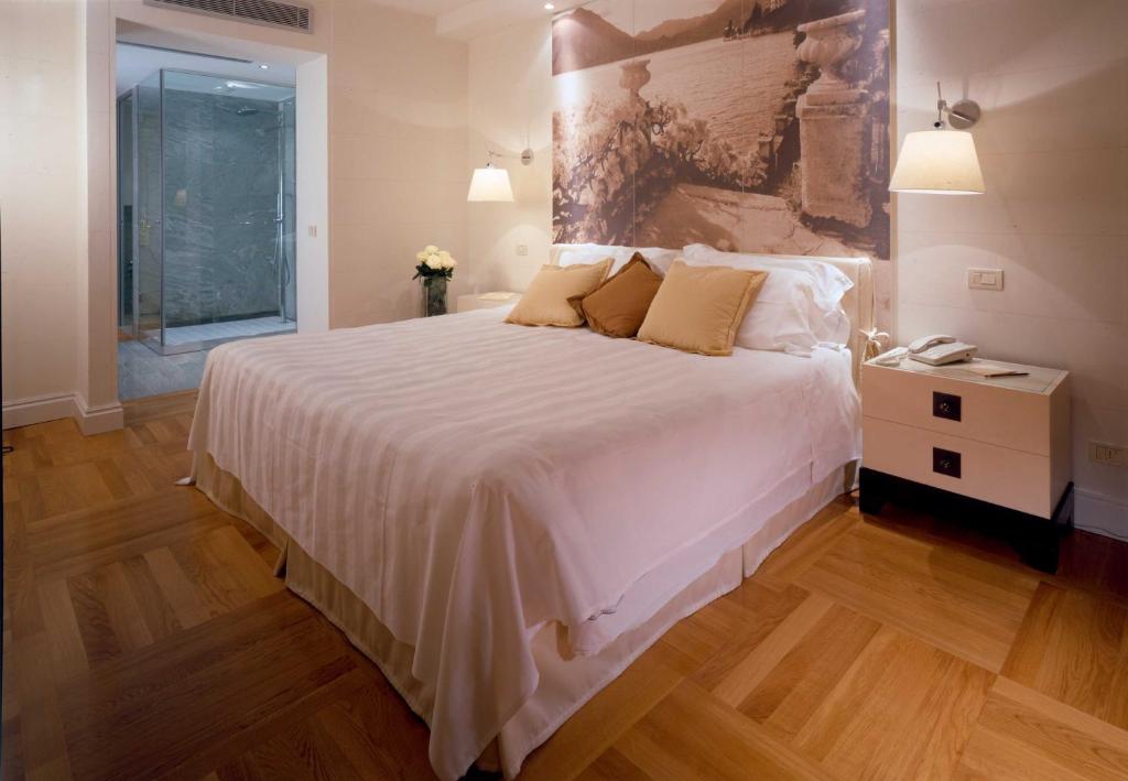 Двухместный (Двухместный номер Делюкс с 1 кроватью или 2 отдельными кроватями) отеля Albergo Terminus, Комо
