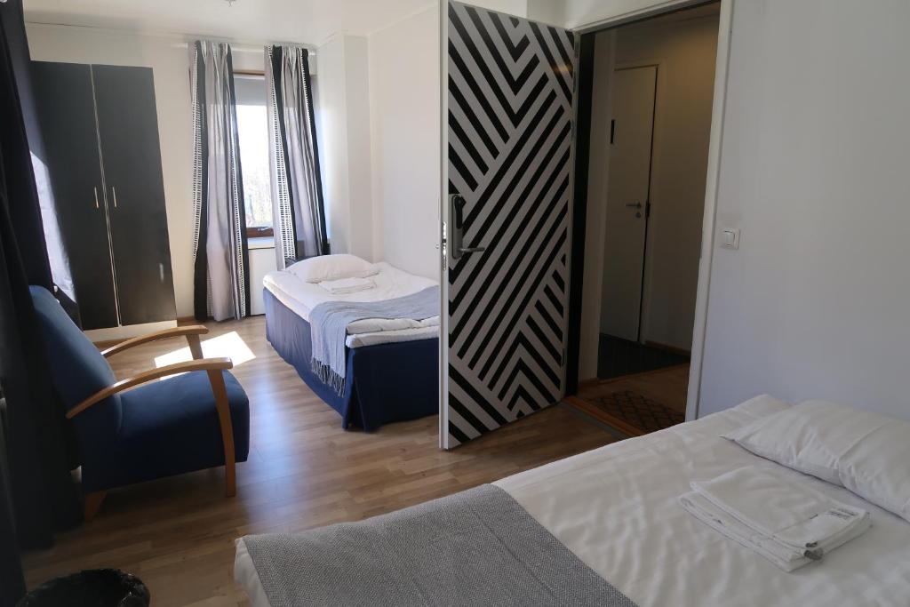 Двухместный (Двухместный номер с 2 отдельными кроватями и собственной ванной комнатой) хостела Hostel Villa Kemi, Кеми (Лаппи)