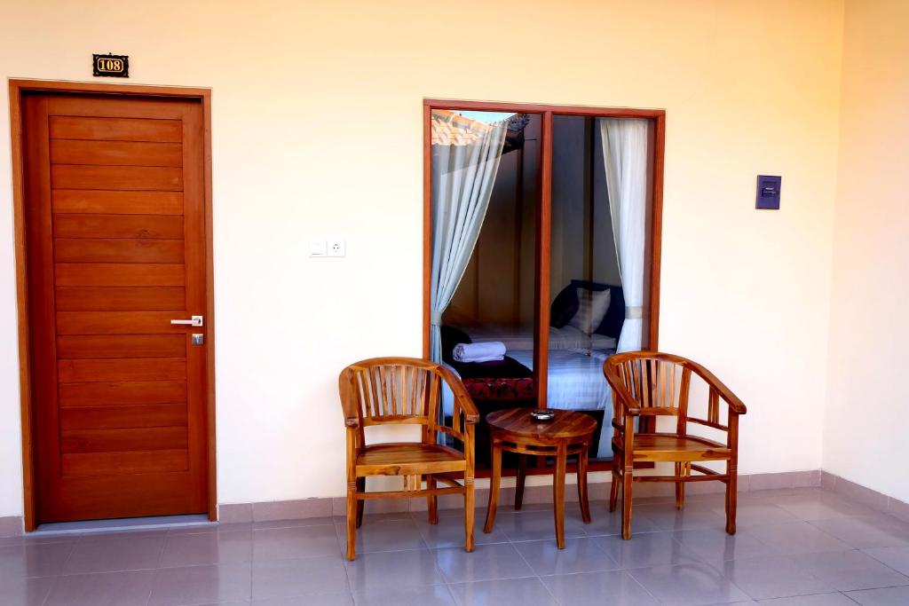 Двухместный (Двухместный номер с 2 отдельными кроватями и террасой) отеля Tom's Inn Pecatu, Улувату