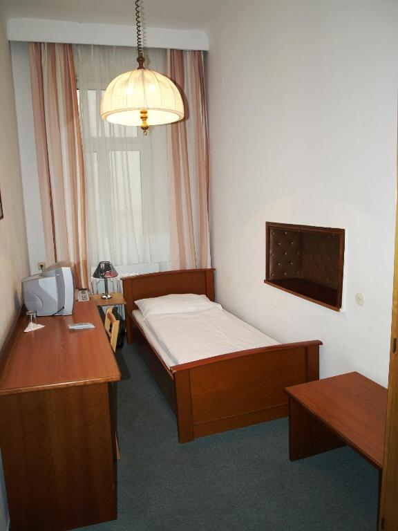 Одноместный (Одноместный номер с общей ванной комнатой) отеля Hotel Terminus, Вена