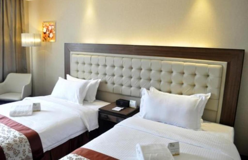 Двухместный (Двухместный номер Делюкс с 2 отдельными кроватями) отеля ACE Hotel and Suites, Манила