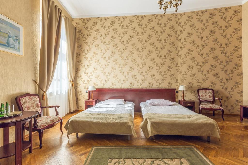 Двухместный (Улучшенный двухместный номер с 1 кроватью или 2 отдельными кроватями) отеля Hotel Royal, Краков