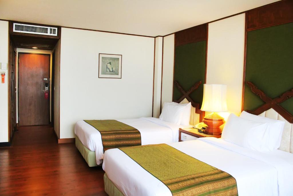 Двухместный (Двухместный номер Делюкс с 1 кроватью или 2 отдельными кроватями) отеля Chiang Mai Orchid, Чиангмай