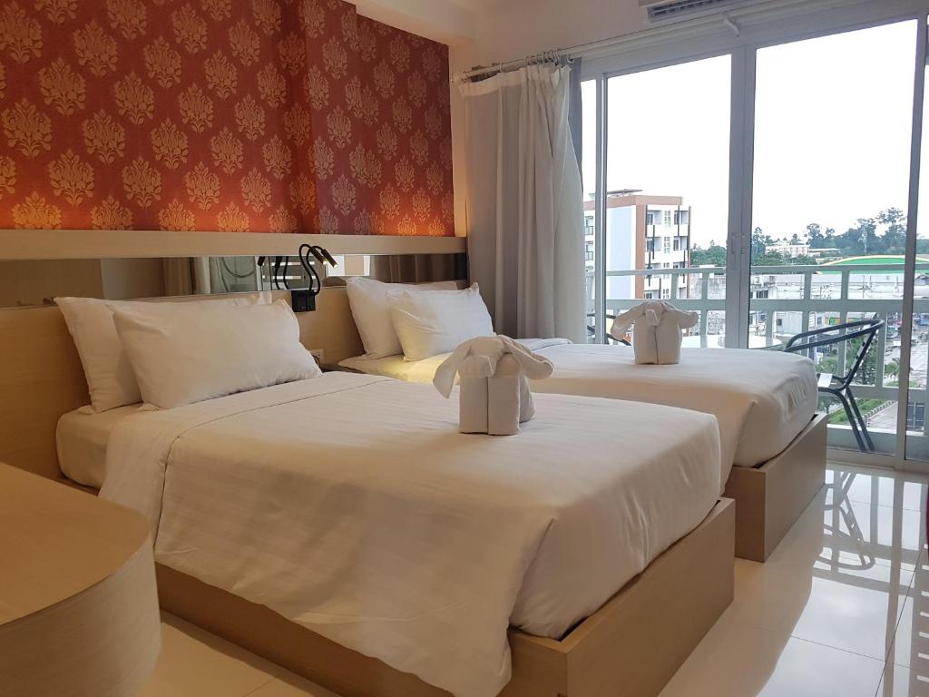 Двухместный (Стандартный двухместный номер с 1 кроватью или 2 отдельными кроватями) отеля Kavin Buri Green, Удонтхани