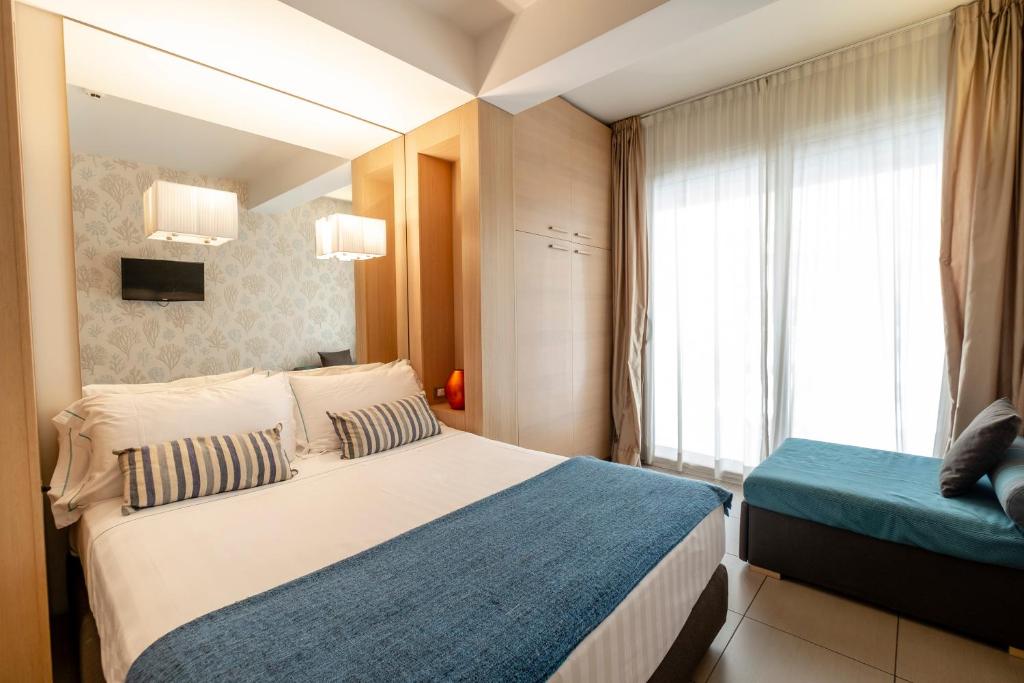 Двухместный (Улучшенный двухместный номер с 1 кроватью) отеля Le Rose Suite Hotel, Римини