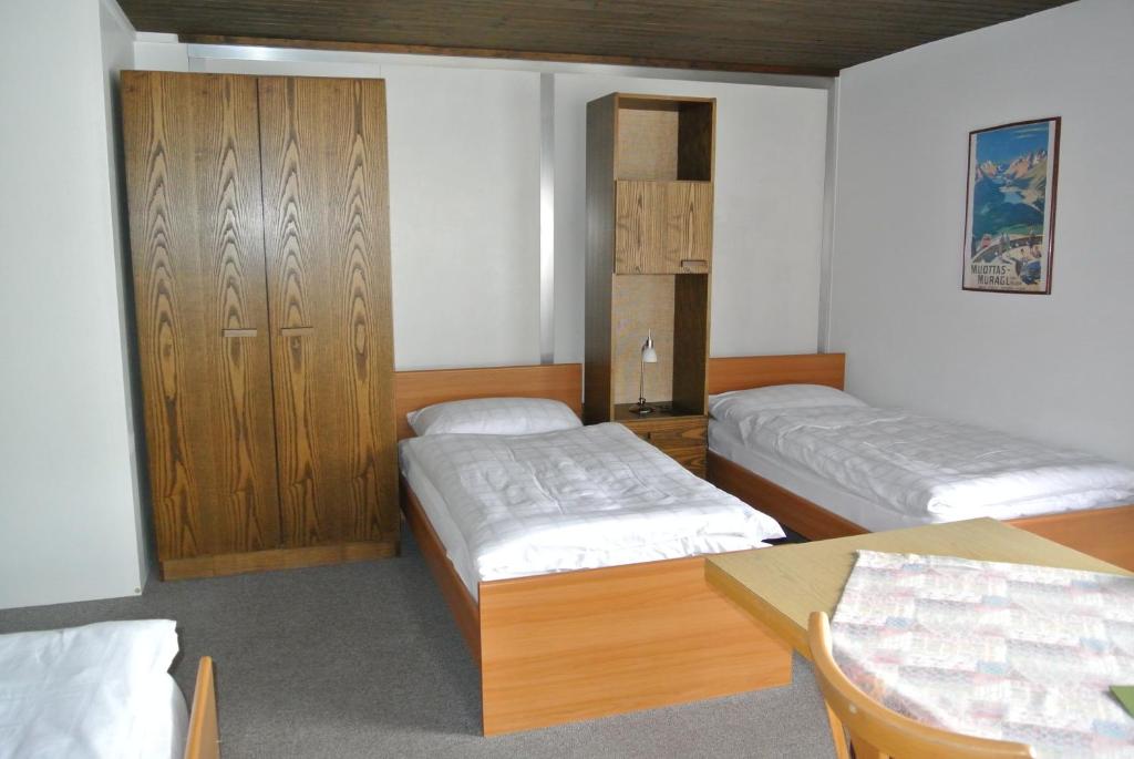 Четырехместный (Четырехместный номер с общей ванной комнатой) гостевого дома Casa Franco St. Moritz, Санкт-Мориц
