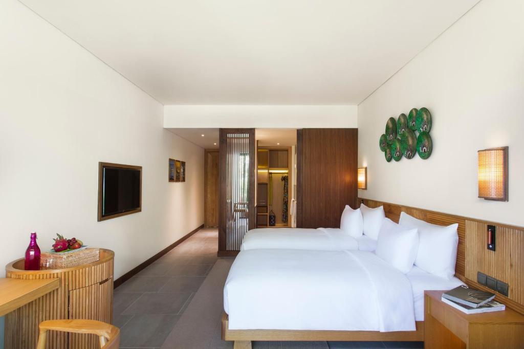 Двухместный (Номер Делюкс с 2 односпальными кроватями и видом на океан) курортного отеля Dusit Princess Moonrise Beach Resort, Дуонг-Донг