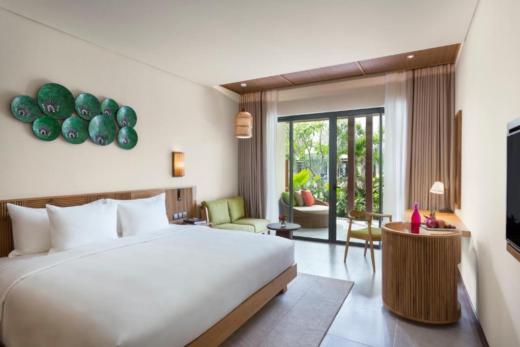 Двухместный (Номер Делюкс Garden с кроватью размера «king-size») курортного отеля Dusit Princess Moonrise Beach Resort, Дуонг-Донг