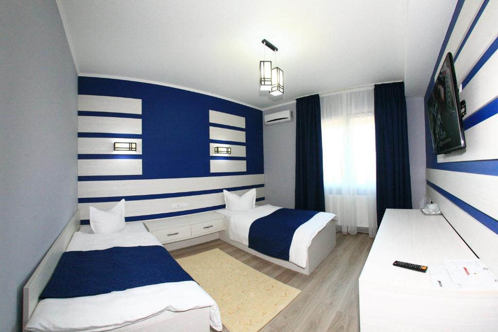 Двухместный (Двухместный номер Делюкс с 2 отдельными кроватями) отеля Motel Sheriff, Бистрица