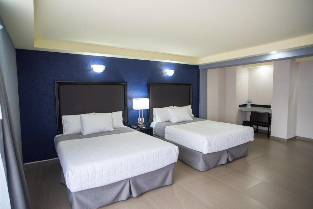 Четырехместный (Номер с 2 кроватями размера «queen-size») отеля Hotel Ha, Орисаба