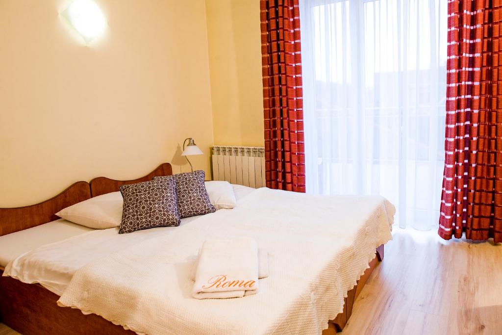 Двухместный (Просторный двухместный номер с 2 отдельными кроватями) отеля Willa Roma Hotel with terrace, Бренна