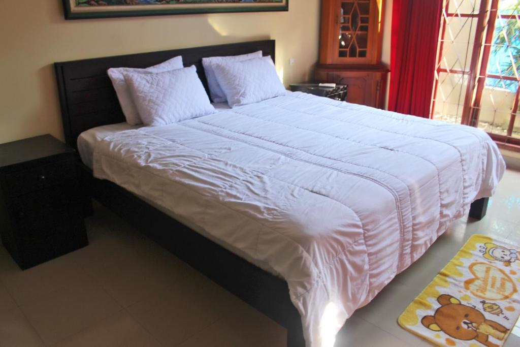 Двухместный (Двухместный номер с 1 кроватью и собственной ванной комнатой вне номера) гостевого дома Pondok Rafflesia, Чангу