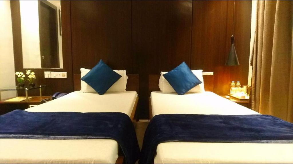 Двухместный (Двухместный номер Делюкс с 2 отдельными кроватями) отеля Tatvam Residency, Калькутта