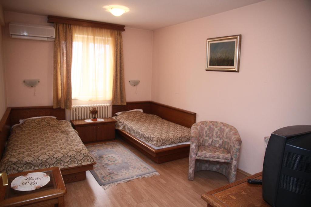 Двухместный (Двухместный номер с 1 кроватью или 2 отдельными кроватями) отеля Garni Hotel PBG, Суботица