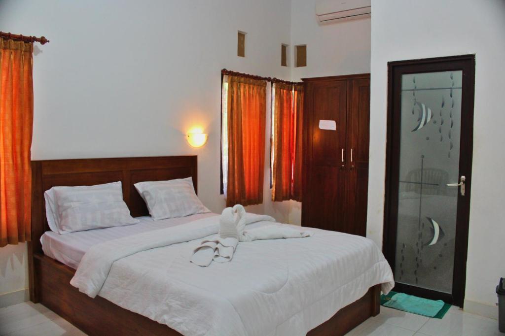 Двухместный (Двухместный номер с 1 кроватью и террасой) гостевого дома Nyuh Kadah Guest House, Нуса Пенида
