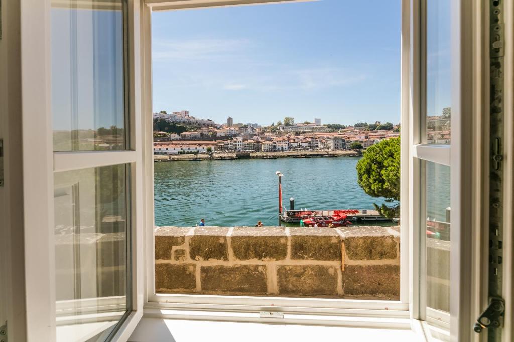 Апартаменты (Номер-студио с видом на реку - Прилегающее здание) апарт-отеля Porto River, Порту