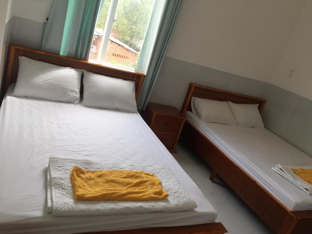 Двухместный (Двухместный номер с 2 отдельными кроватями) отеля Motel Trần Nguyễn, Лаги