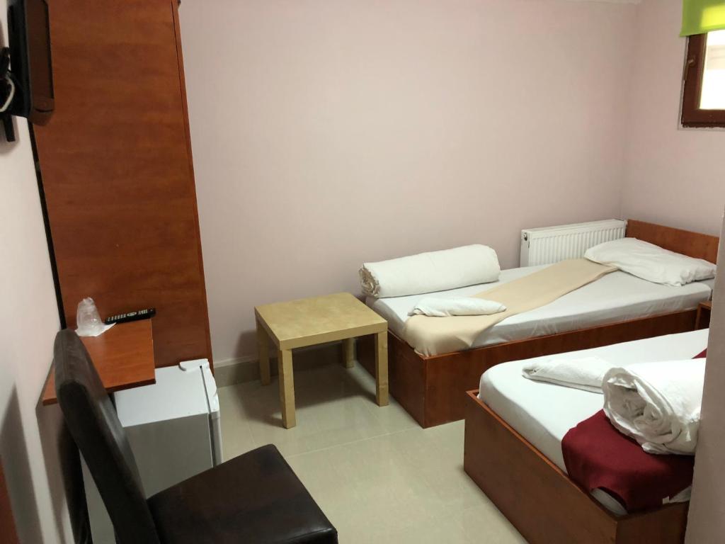 Двухместный (Стандартный двухместный номер с 2 отдельными кроватями) хостела Hostel Tripoli, Бухарест