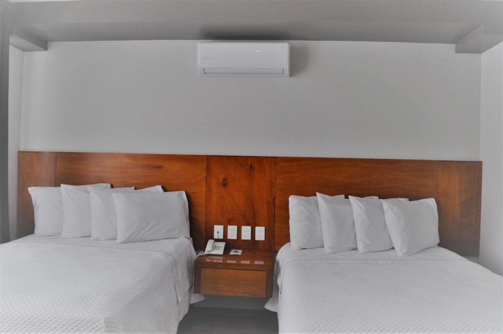 Двухместный (Двухместный номер с 2 отдельными кроватями) отеля AMD Hotel, Сан-Хуан-де-лос-Лагос