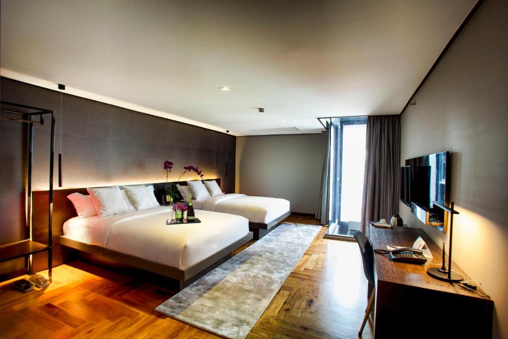 Двухместный (Двухместный номер Делюкс с 1 кроватью или 2 отдельными кроватями) отеля Ramada Encore by Wyndham Makati, Манила