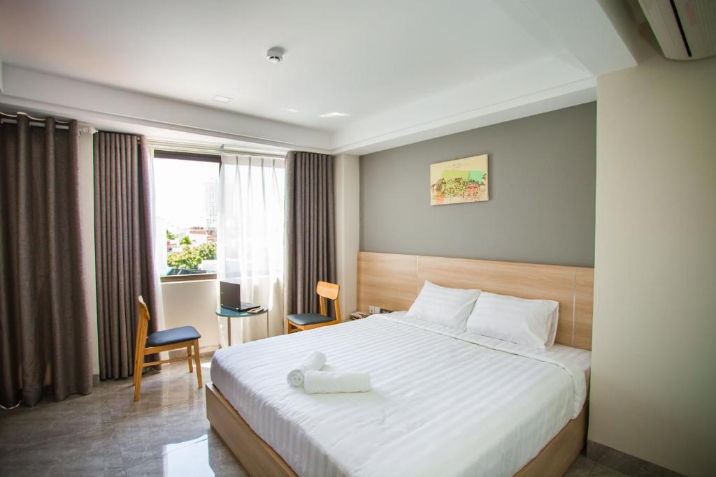 Двухместный (Улучшенный двухместный номер с 1 кроватью) отеля Moonlight Bay, Нячанг
