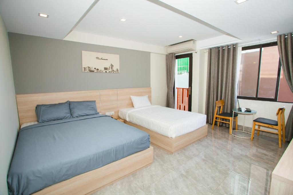 Двухместный (Улучшенный двухместный номер с 2 отдельными кроватями) отеля Moonlight Bay, Нячанг