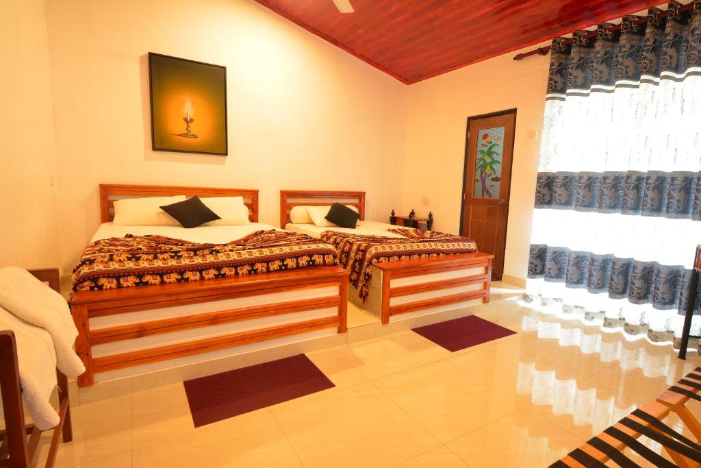 Двухместный (Улучшенный двухместный номер с 1 кроватью) отеля Kandy Riverside Villa, Канди
