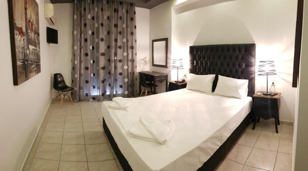 Двухместный (Улучшенный двухместный номер с 1 кроватью или 2 отдельными кроватями) отеля Artemision, Лутра-Эдипсу