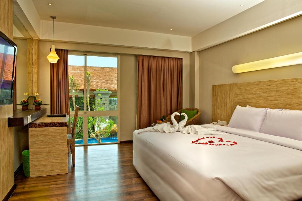 Двухместный (Двухместный номер Делюкс с 1 кроватью или 2 отдельными кроватями) отеля Bintang Kuta Hotel, Кута