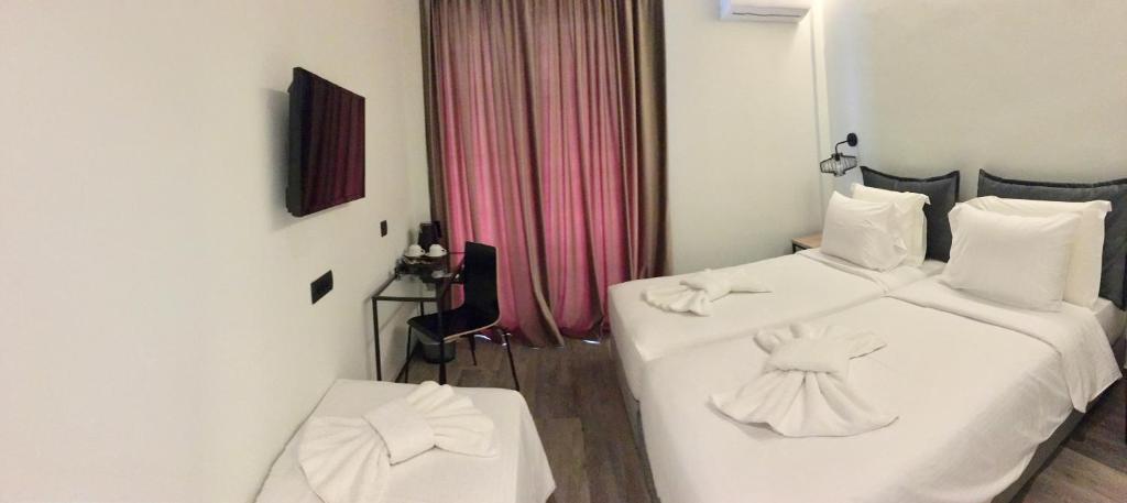 Двухместный (Двухместный номер с 1 кроватью или 2 отдельными кроватями и дополнительной кроватью (для 2 взрослых и 1 ребенка)) отеля Athens coast hotel, Афины