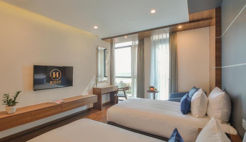 Двухместный (Специальное предложение — Улучшенный двухместный номер с 2 отдельными кроватями и частичным видом на море) отеля HAIAN Beach Hotel & Spa, Дананг