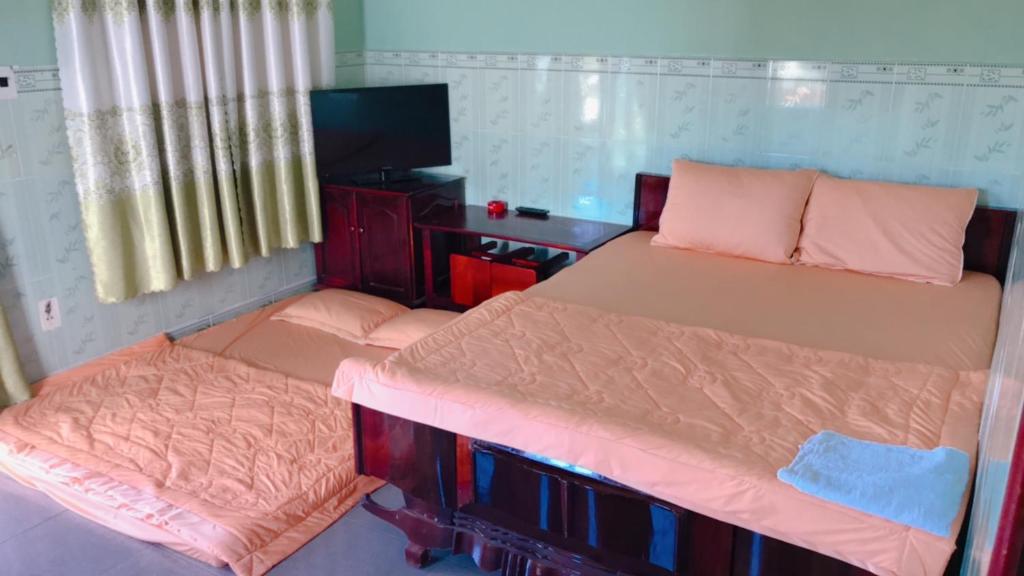 Четырехместный (Четырехместный номер) мотеля Ngoc Ha Motel, Вунгтау