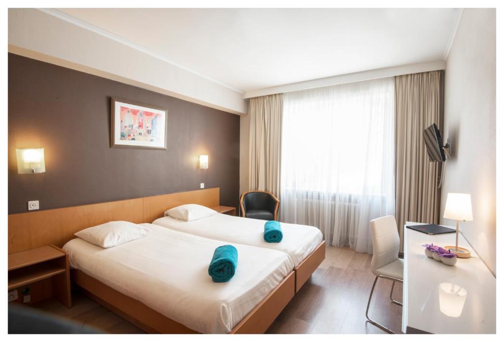 Двухместный (Стандартный двухместный номер с 1 кроватью или 2 отдельными кроватями) отеля Hotel Ter Streep, Остенде