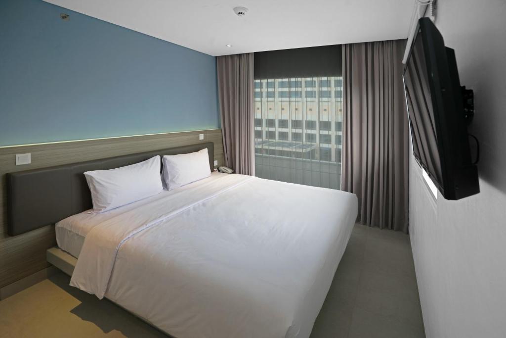 Двухместный (Стандартный двухместный номер с 1 кроватью) отеля Amaris Hotel Fachrudin – Tanah Abang, Джакарта